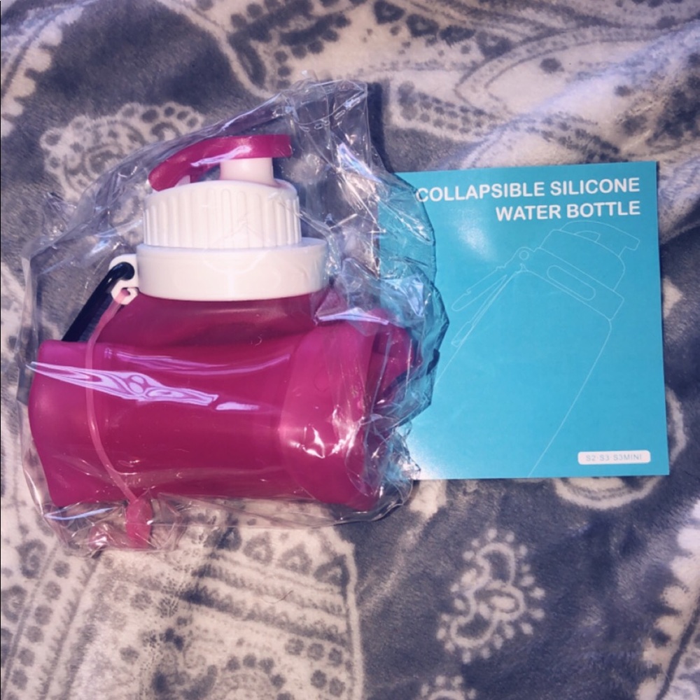 Pink collapsible silicone water bottle